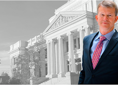 Brad DeBry in front of courthouse — aggressive personal injury litigation